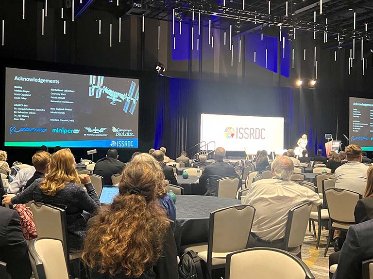 Katy Martin, outreach and communications lead at miniPCR bio, gives a Lightning Talk on STEM engagement and workforce development at ISSRDC 2023.