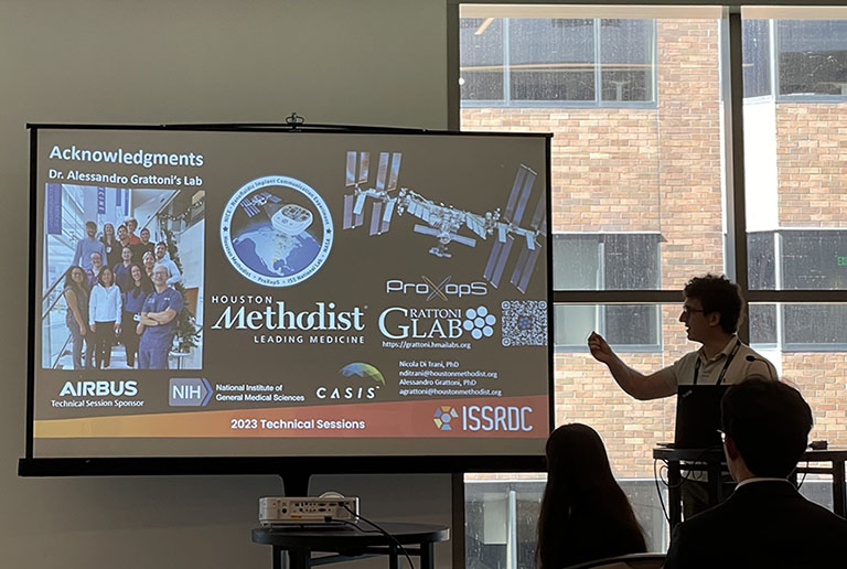 Houston Methodist Research Institute scientist Nicola Di Trani presents research on a tunable drug delivery implant during one of the technical sessions at ISSRDC 2023.