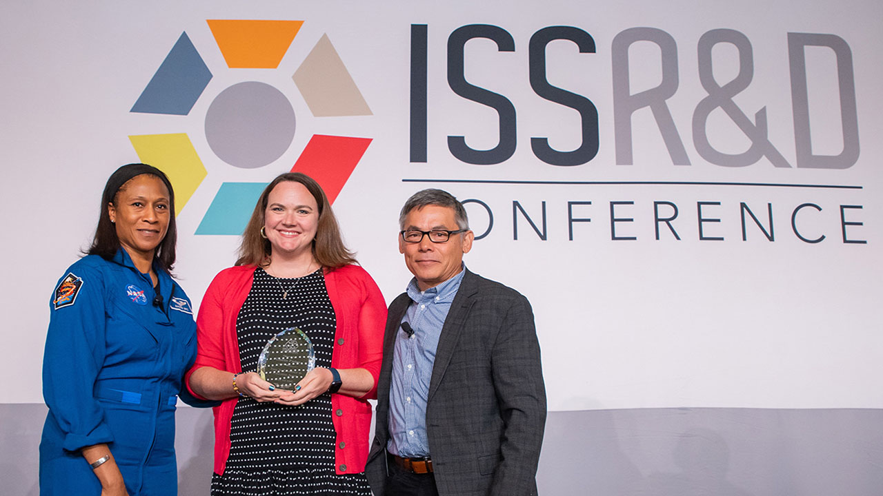 NASA astronaut Jeanette Epps, Lauren Parker and Ted Tagami at ISSRDC 2022