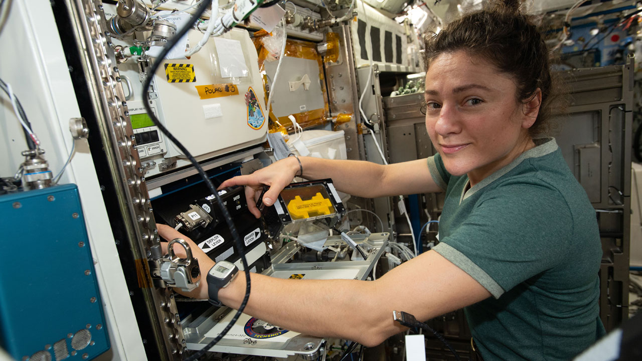 NASA astronaut and Expedition 61 Flight Engineer Jessica Meir installs the Bone Densitometer in an EXPRESS (EXpedite the PRocessing of Experiments to Space Station) rack located inside the Japanese Kibo laboratory module. The Bone Densitometer enables the imaging of rodent bones for the Rodent Research 19 experiment that is investigating two proteins that may prevent muscle and bone loss in space.