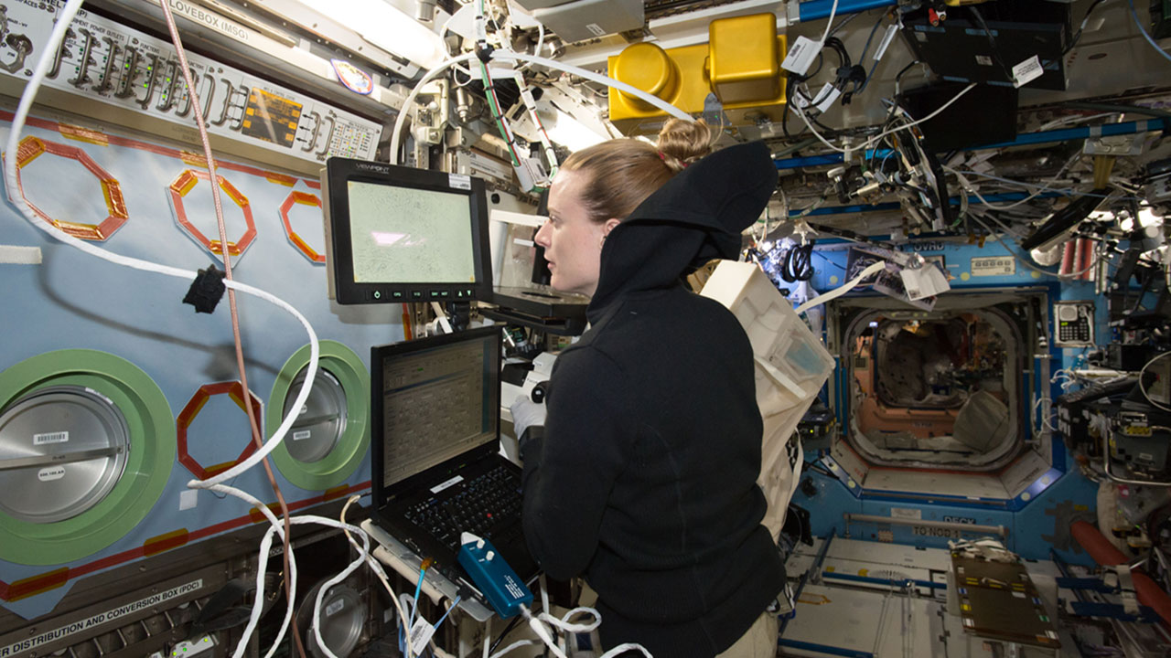 NASA astronaut Kate Rubins examines heart cells onboard the ISS as part of the Effects of Microgravity on Stem Cell Derived Heart Cells investigation.