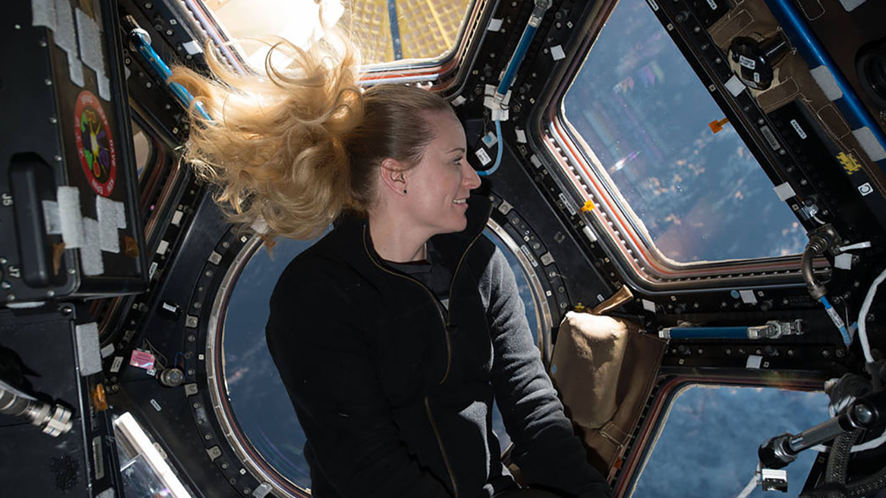 Kate Rubins in the Cupola of the ISS