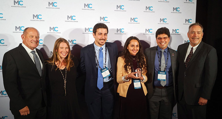 Encapsulate LLC was awarded a 2019 MassChallenge Technology in Space Prize from the ISS National Lab and Boeing. Encapsulate Co founder and CEO Armin Rad (second from right), Co founder and COO Leila Daneshmandi (third from right), and Co founder and CTO Reza Amin (fourth from right) are pictured here.