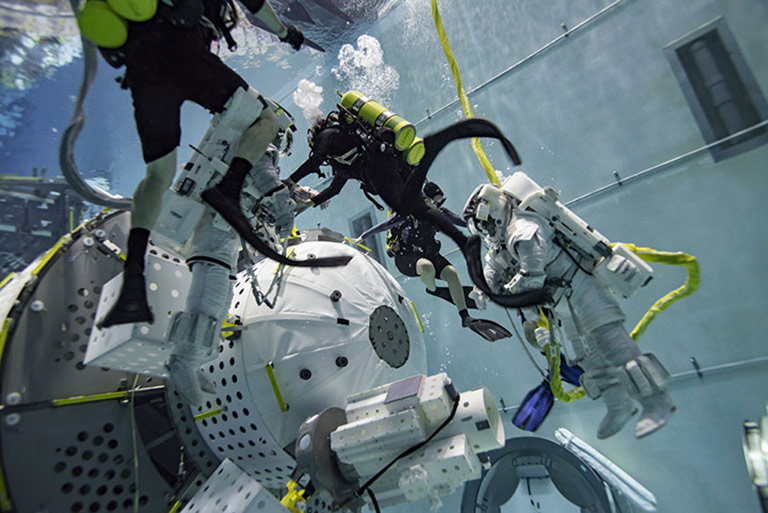 A NASA mock up of the NanoRacks Airlock Module successfully passed astronaut extravehicular activity training testing at Johnson Space Centers Neutral Buoyancy Lab in Houston, Texas.