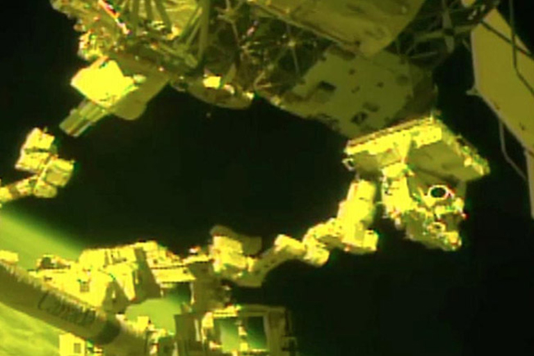 MUSES being installed on external logistics carrier (ELC4) by robotic arm