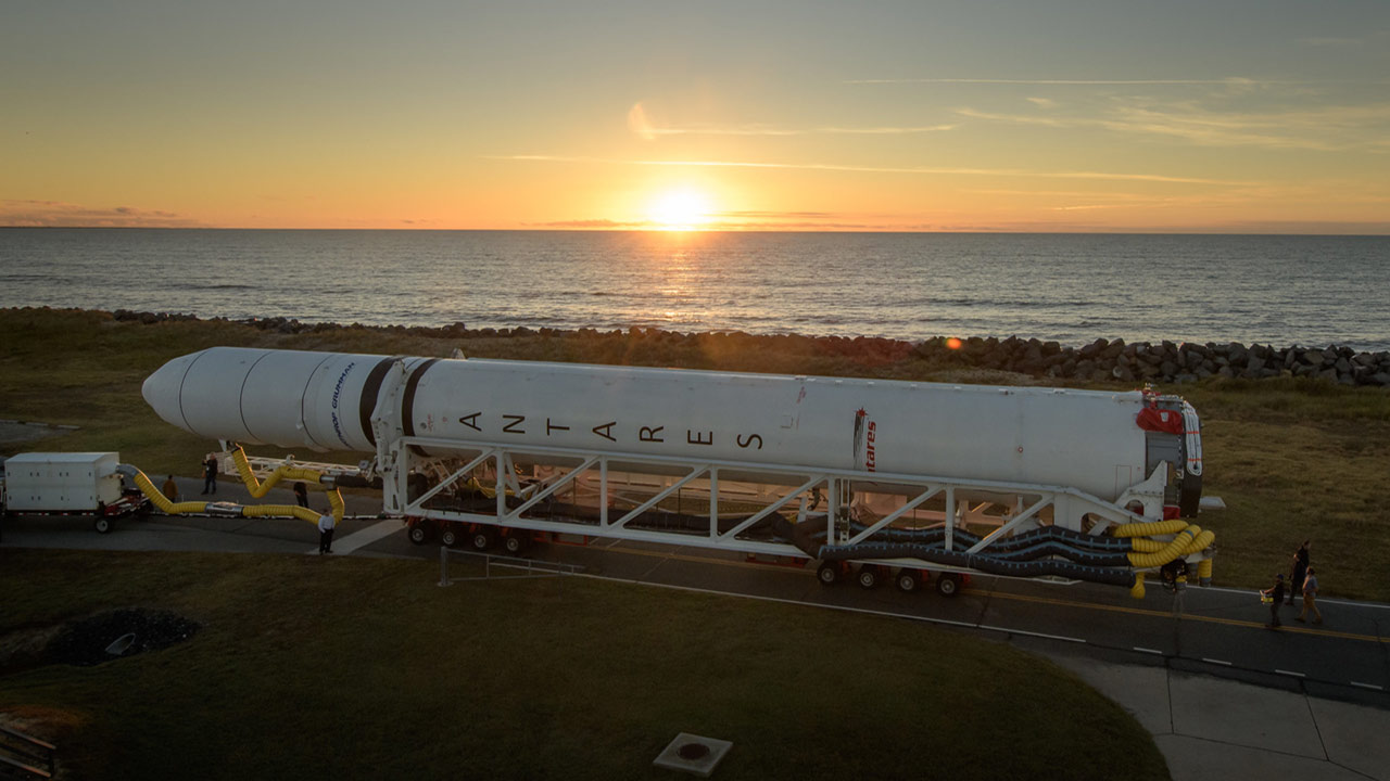 A Northrop Grumman Antares rocket is seen as it rolls out to Pad 0A, Tuesday, Oct. 29, 2019, at NASAs Wallops Flight Facility in Virginia.