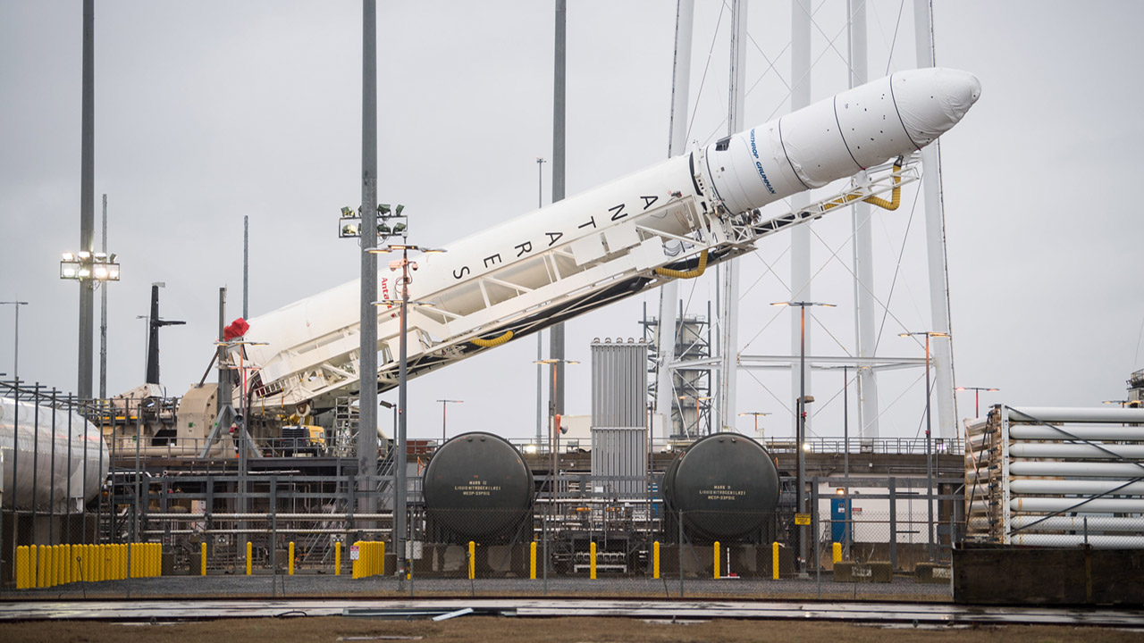 A Northrop Grumman Antares rocket carrying a Cygnus resupply spacecraft is raised into a vertical position on Pad 0A, Wednesday, Feb. 5, 2020, at NASAs Wallops Flight Facility in Virginia. Northrop Grummans 13th contracted cargo resupply mission with NASA to the International Space Station will deliver about 8,000 pounds of science and research, crew supplies and vehicle hardware to the orbital laboratory and its crew. The CRS 13 Cygnus spacecraft is named after the first African American astronaut, Major Robert Henry Lawrence Jr., and is scheduled to launch at 5:39pm EST Sunday, Feb. 9.