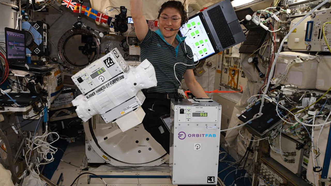 NASA astronaut Christina Koch monitors a satellite refueling experiment called Furphy on the ISS developed by startup company Orbit Fab.