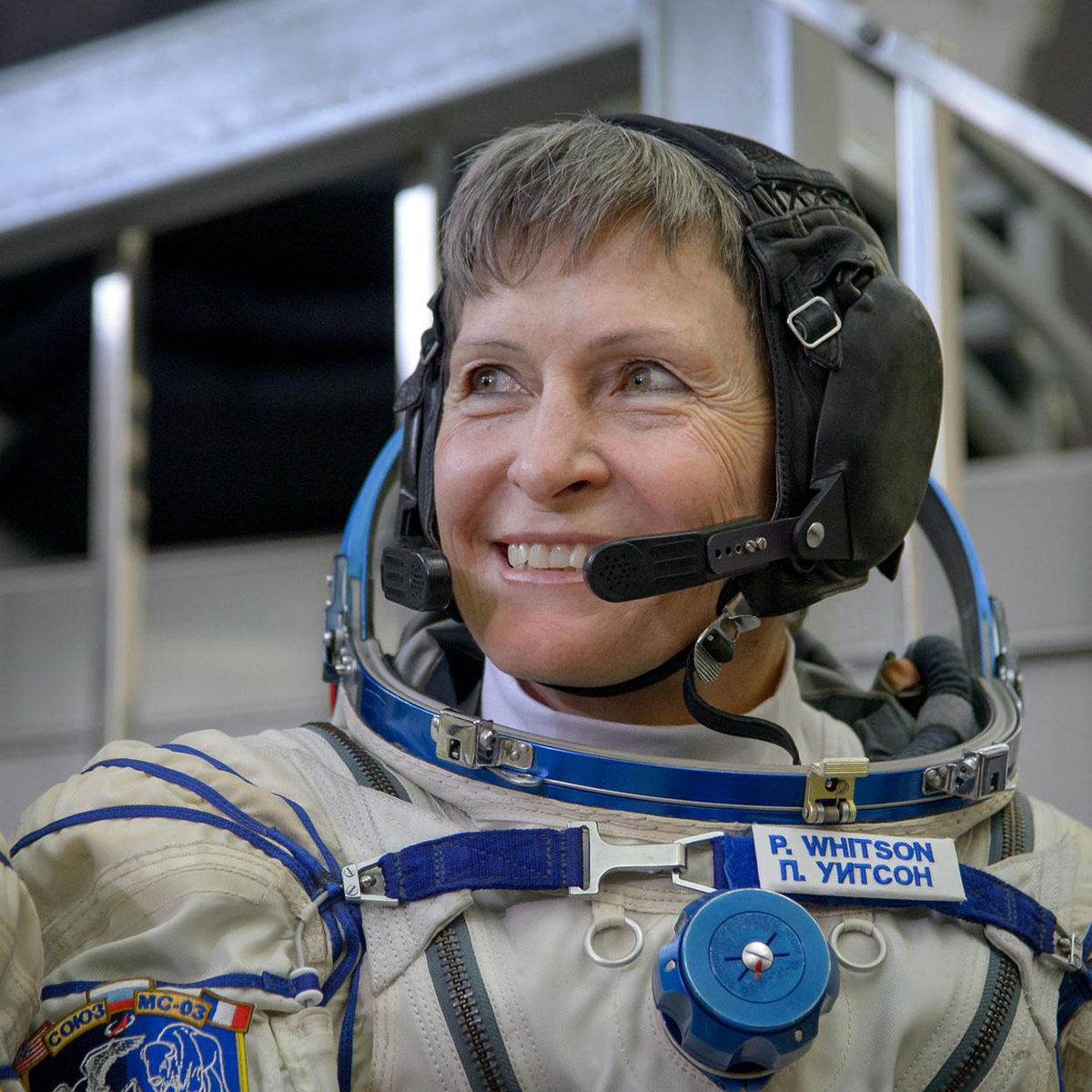 Expedition 50 NASA astronaut Peggy Whitson smiles as she listens to a reporters question ahead of the final qualification exams with fellow crew mates Russian cosmonaut Oleg Novitskiy of Roscosmos and ESA astronaut Thomas Pesquet, Tuesday, Oct. 25, 2016, at the Gagarin Cosmonaut Training Center (GCTC) in Star City, Russia.