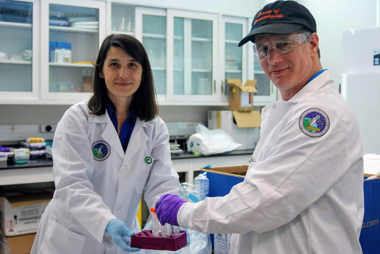 Dr. Fatma Kaplan, Pheronym, and Dr. David Shapiro Ilan, USDA Agricultural Research Service, select insects to be used in the experiment.