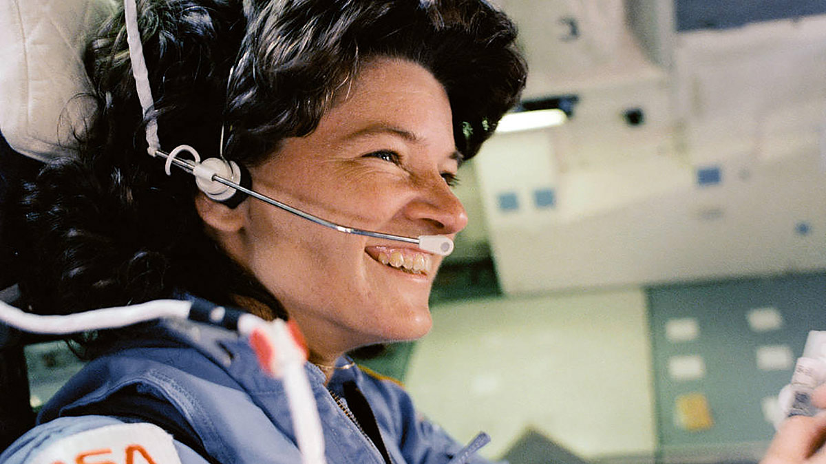 On June 18, 1983, Sally Ride became the first American woman to fly in space when the space shuttle Challenger launched on mission STS 7. As one of the three mission specialists on the STS 7 mission, she played a vital role in helping the crew deploy communications satellites, conduct experiments and make use of the first Shuttle Pallet Satellite. In this image, Dr. Ride sits in the aft flight deck mission specialists seat during deorbit preparations.