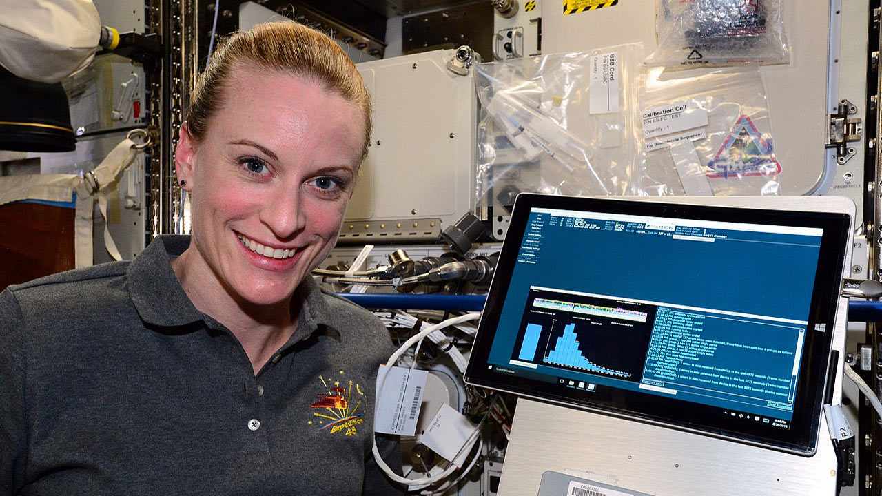 Rubins is pictured aboard ISS with the USB MinION sequencer (lower right), created by Oxford Nanopore Technologies, and was used in the first ever DNA sequencing in space in August 2016.