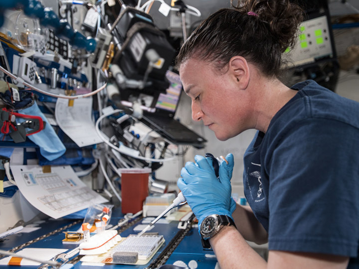 NASA astronaut Serena Aun Chancellor mixes protein crystal samples onboard the ISS. BioServe Protein Crystallography 1 seeks to demonstrate the feasibility of conducting protein crystal growth in real time onboard the space station. Crew members add solutions to the hardware, observe the crystals that form, and adjust for follow on experiments.