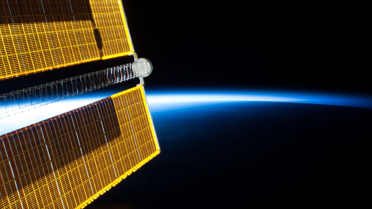The International Space Station soars into a sunrise every 90 minutes, each and every day. This image, taken on July 20, 2018, shows one of four basketball court sized main solar arrays that power the space station, in contrast to the bright blue glow of Earths limb in the background as the orbital complex flew over eastern China.