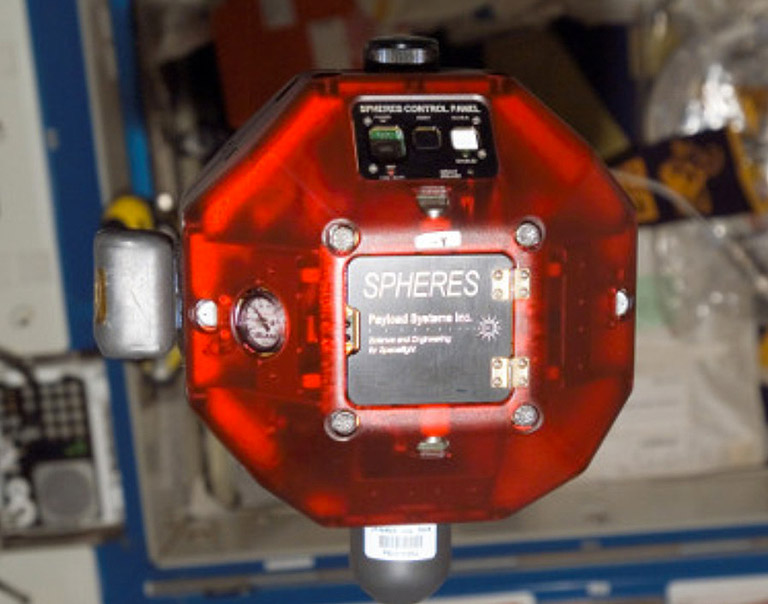 The SPHERES robot named Red carried out the winning teams program in the final round.