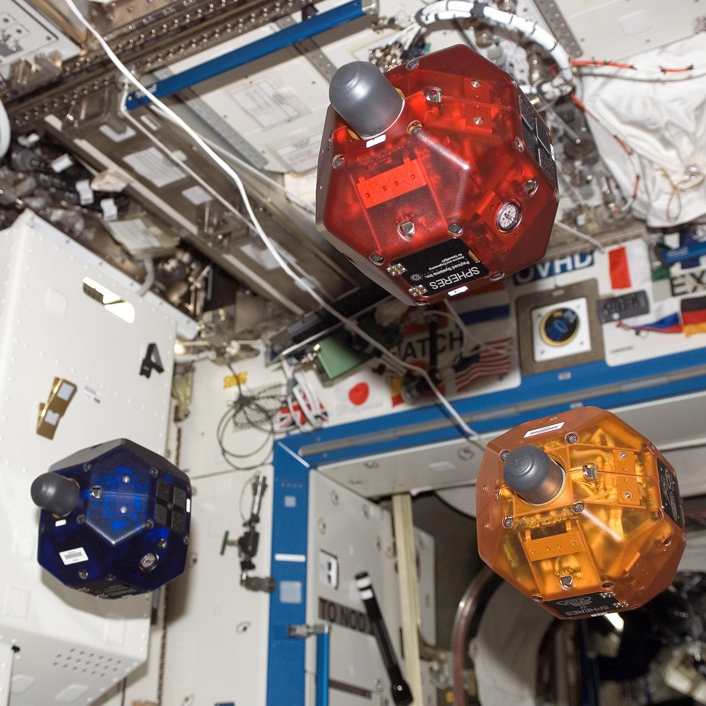Three satellites fly in formation as part of the Synchronized Position Hold, Engage, Reorient, Experimental Satellites (SPHERES) investigation. This image was taken during Expedition 16 in the Destiny laboratory module.