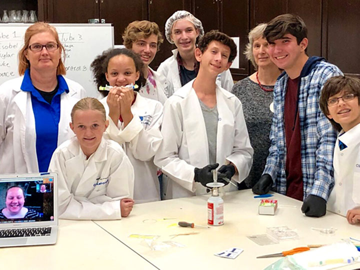 The iLEAD team from Santa Clarita Valley International Charter High School and their project Drinking Coffee in Space: The Impact of Microgravity on Streptococcus mutans on Susceptibility to Coffee.
