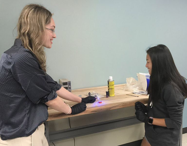 Adia and a mentor did several tests with UV activated dental adhesive as they developed a design for the experiment.