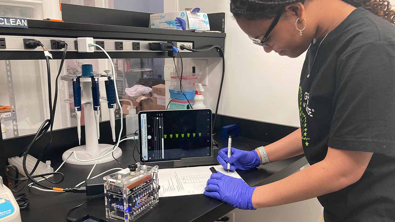 Pristine Onuoha logs data during a pilot run of her experiment.