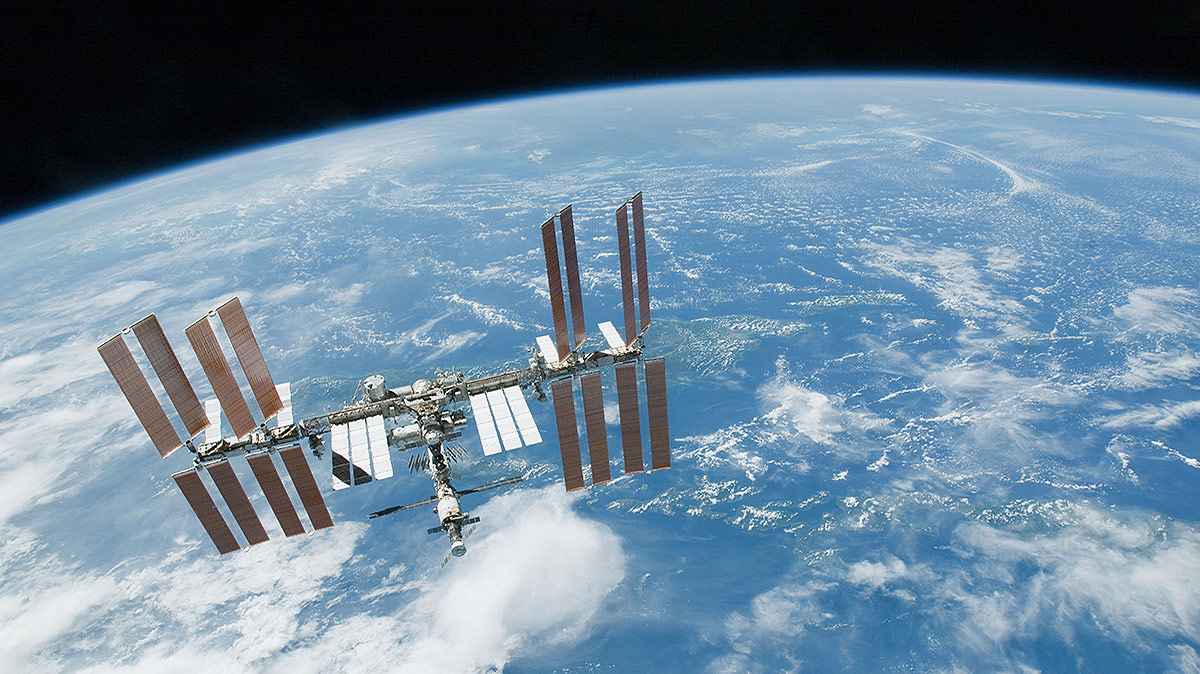 station over blue white earth
