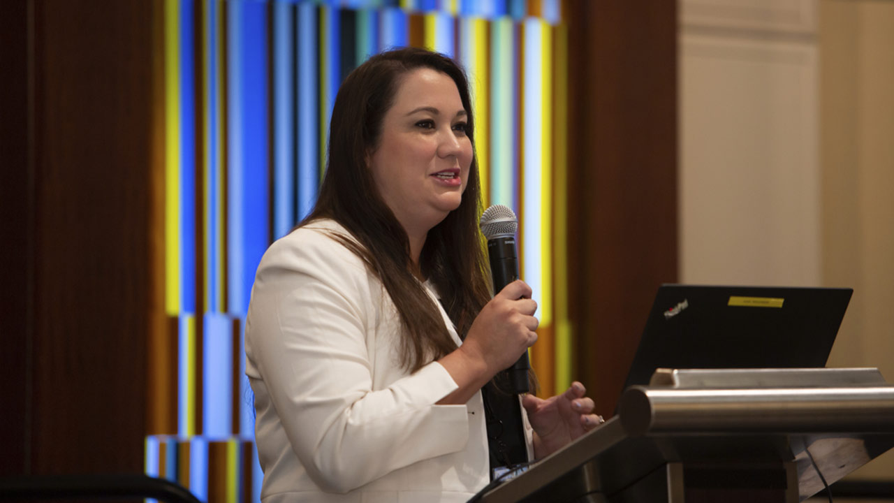 Stephanie Murphy, founder of Alpha Space Test & Research Alliance, speaking at the womens networking breakfast at the 2019 ISS Research and Development Conference.