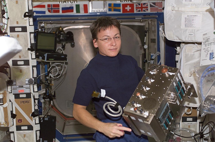Astronaut Peggy Whitson installs SUBSA hardware on the International Space Station.