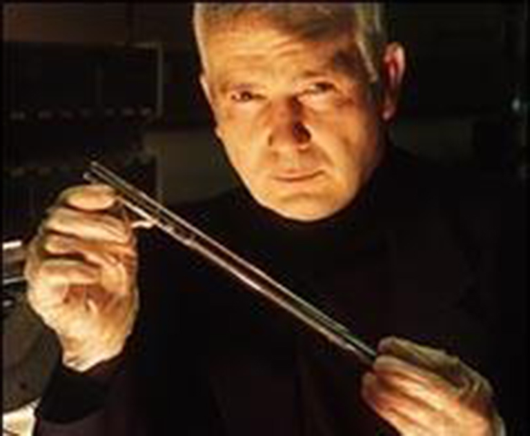 SUBSA Principal Investigator, Aleksander Ostrogorsky, Ph.D. holding a SUBSA ampoule