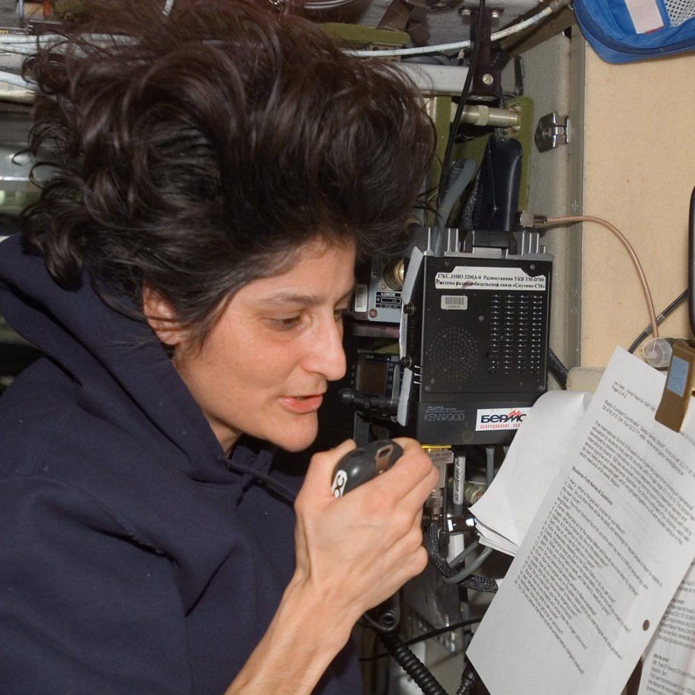 ISS014 E 18307 (27 March 2007) Astronaut Sunita L. Williams, Expedition 14 flight engineer, talks with students at the International School of Brussels in Belgium during an Amateur Radio on the International Space Station (ARISS) contact in the Zvezda Service Module.