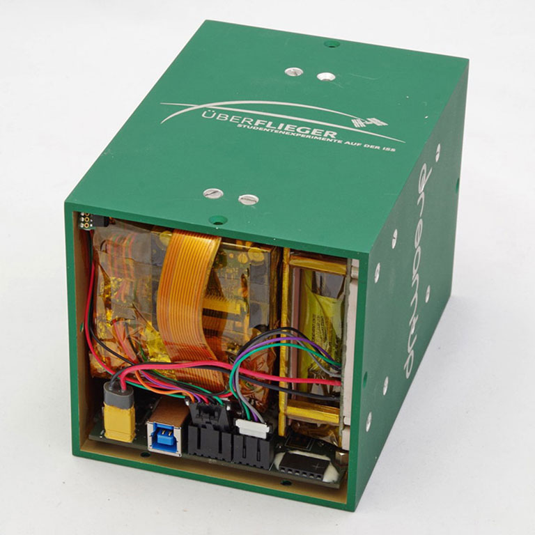 All the components of the EXCISS experiment fit into this 10 centimeter cube!