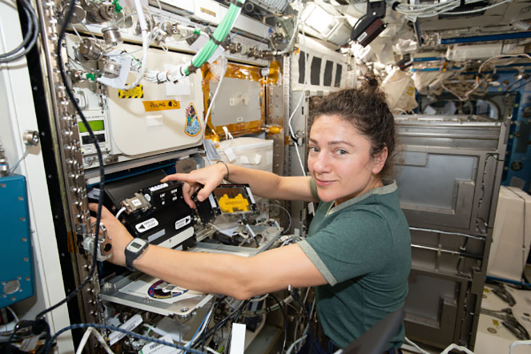 NASA astronaut Jessica Meir uses a bone densitometer on the space station to measure each mouses bone density throughout the experiment.