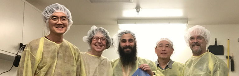 Team Mighty Mice poses for a photo before their experiment launches to space.