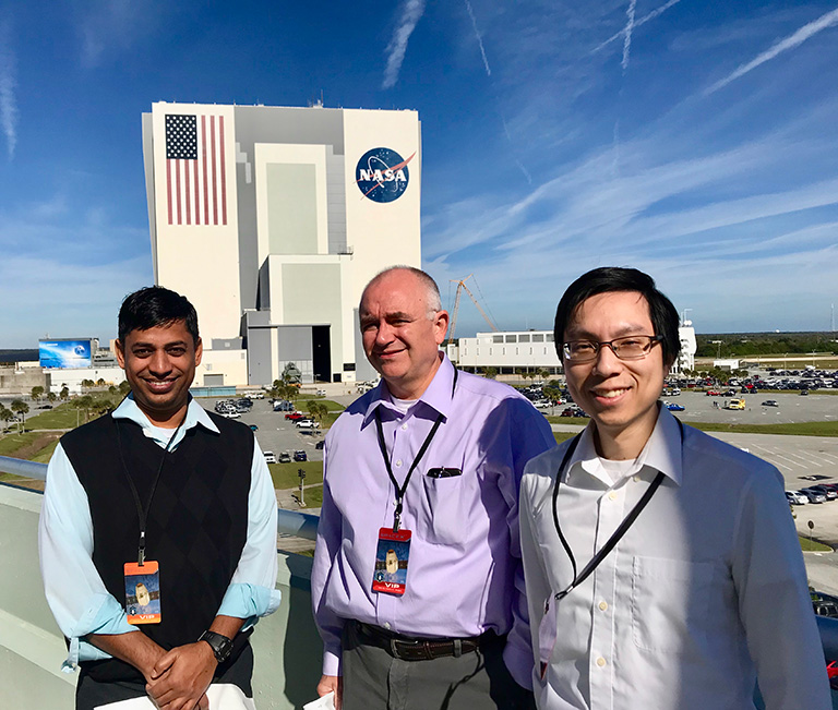 The Frederick National Lab team (left to right: Dhirendra Simanshu, Dwight Nissley, Albert Chan) at NASAs Kennedy Space Center before the SpaceX CRS 16 launch