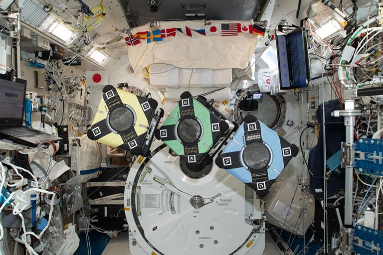 A view of the Astrobee robotic free-flyers in support of the Kibo Robot Programming Challenge (Robo-Pro Challenge). The Kibo-RPC, allows students to create programs to control Astrobee, a free-flying robot aboard the International Space Station (ISS).