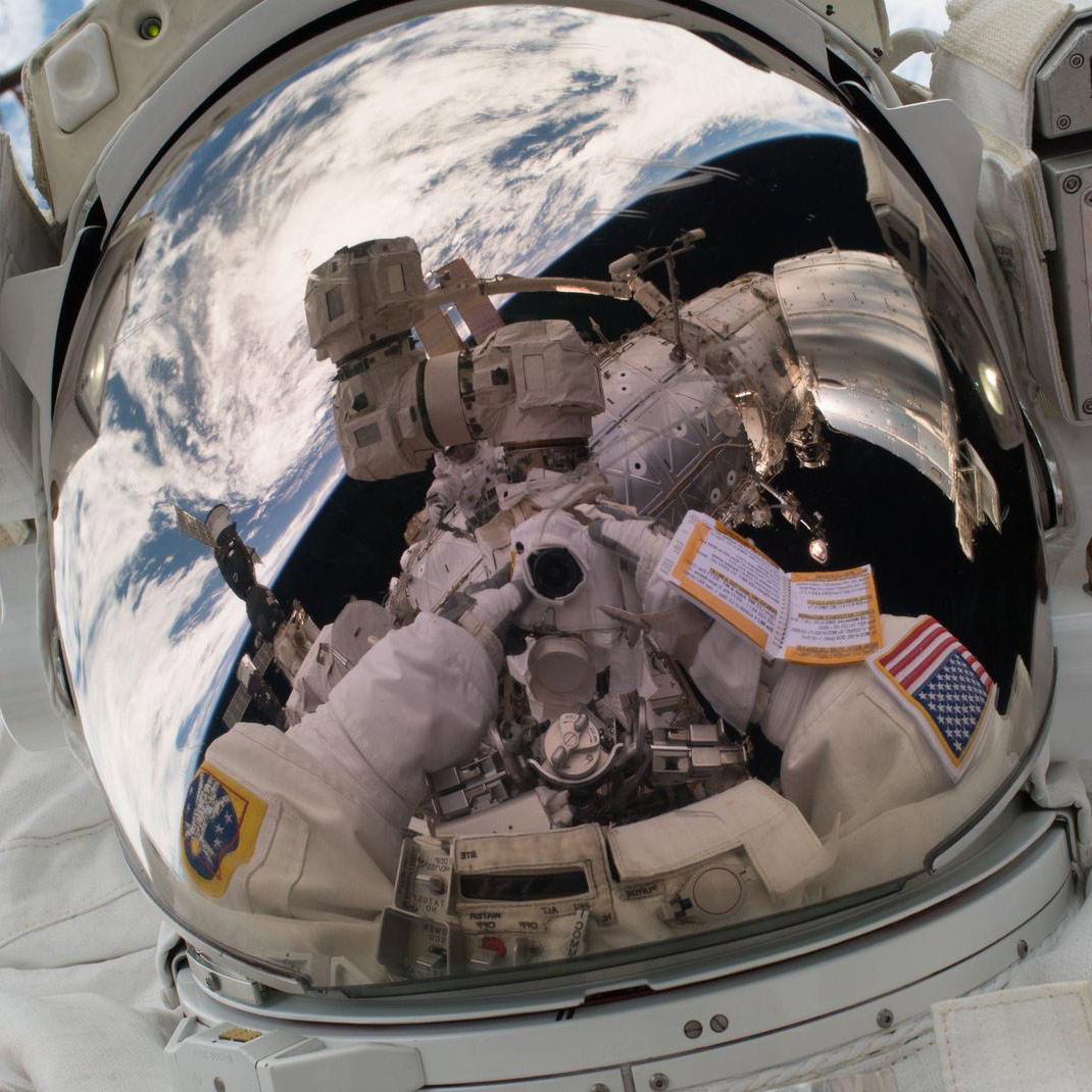 On Tuesday, Jan. 23, 2018, Mark Vande Hei snapped his own portrait, better known as a space selfie, during the first spacewalk of the year. NASA astronauts Vande Hei and crewmate Scott Tingle ventured outside the International Space Station to perform maintenance on the stations Canadarm2 robotic arm during a seven hour and 24 minute spacewalk.