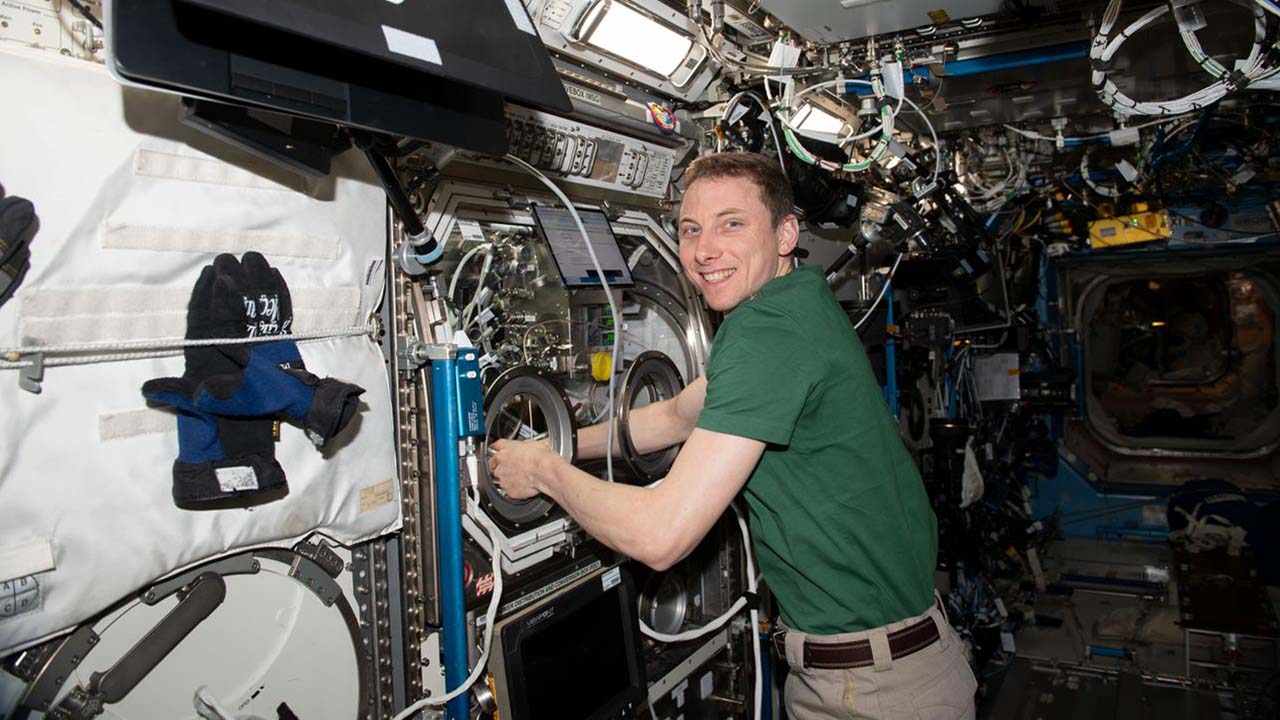NASA astronaut Woody Hoburg works on an experiment from Stanford University that aims to synthesize graphene aerogel in space.