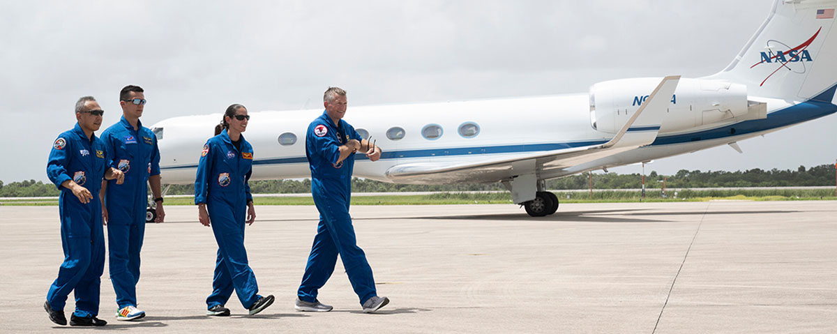 Crew members for NASA’s SpaceX Crew-7 mission to the International Space Station arrive at Kennedy Space Center in Florida on Sunday, Aug. 20, 2023.