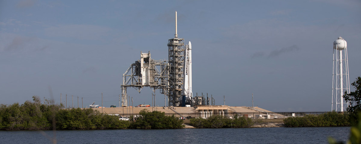 As a Falcon 9 rocket stands ready for liftoff at the Kennedy Space Centers Launch Complex 39A. The rocket will boost a Dragon resupply spacecraft to the International Space Station. Liftoff is scheduled for 5:55 p.m. EDT. On its 11th commercial resupply services mission to the space station, Dragon will bring up 6,000 pounds of supplies, such as the Neutron star Interior Composition Explorer, or NICER, instrument to study the extraordinary physics of neutron stars.