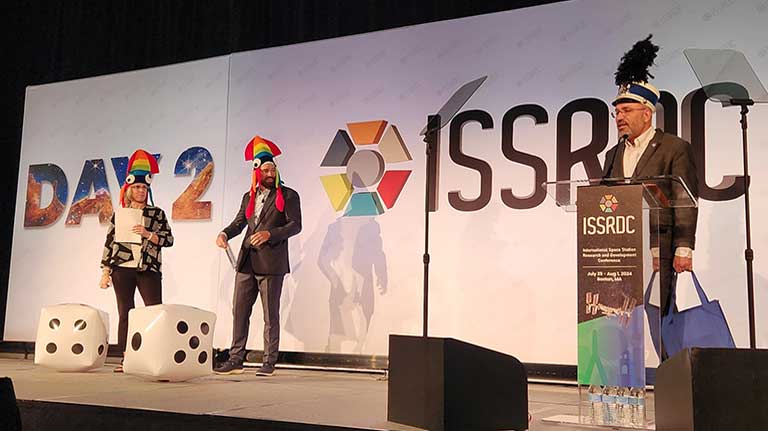 At ISSRDC 2024, the "Payload Pandemonium" gameshow was moderated by Alain Berinstain, CSS chief strategy officer, and hosted by Robbie Hampton, ISS National Lab director of payload operations, and Ryan Prouty, manager of NASA’s ISS Research and Integration Office.