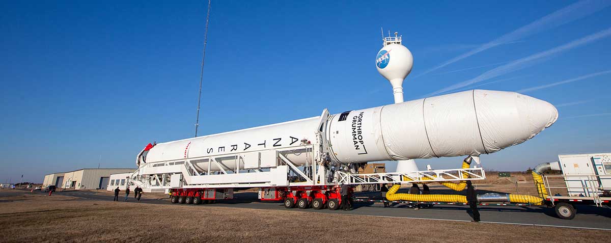 A Northrop Grumman Antares rocket carrying a Cygnus resupply spacecraft is seen as it is transported to the Mid-Atlantic Regional Spaceport’s Pad-0A, Tuesday, Feb. 15, 2022, at NASA's Wallops Flight Facility in Virginia.