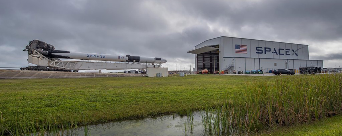 SpaceX’s Falcon 9 rocket with Dragon spacecraft rolls out to Launch Complex 39A at NASA’s Kennedy Space Center in Florida on Dec. 19, 2021, in preparation for launch.