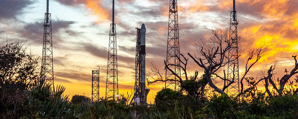 A SpaceX Falcon 9 rocket and cargo Dragon spacecraft stand ready for liftoff at Cape Canaveral Air Force Station in Florida on March 6, 2020, for NASA and SpaceX’s 20th Commercial Resupply Service mission to the ISS.
