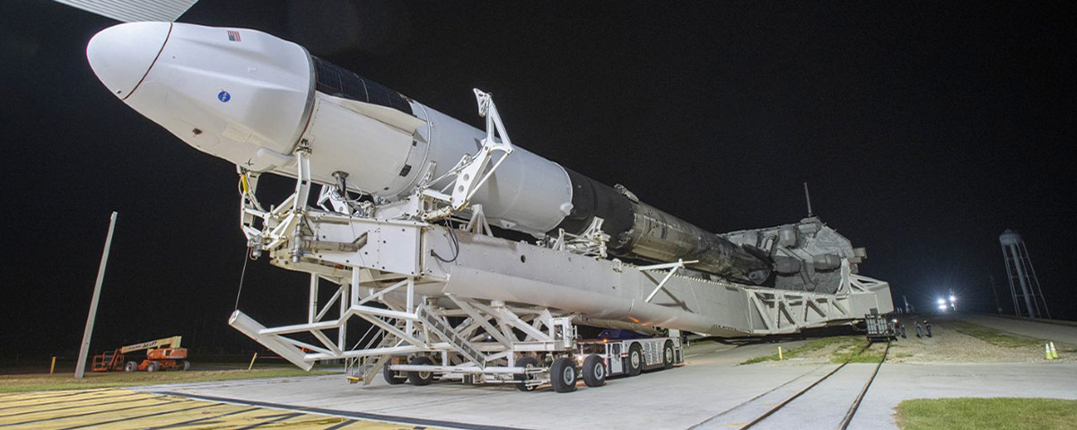 SpaceX’s Dragon spacecraft, seen atop the company’s Falcon 9 rocket, is rolled out to the launch pad at NASA’s Kennedy Space Center in Florida on Aug. 24, 2021, in preparation for the 23rd commercial resupply services launch.