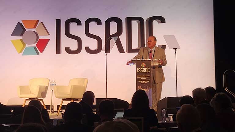 CASIS CEO Ray Lugo welcoming attendees to ISSRDC 2024 in Boston.