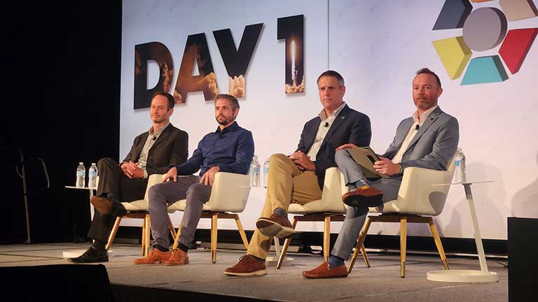 Patrick O’Neill, public affairs and outreach lead for the ISS National Lab (right), moderated a fireside chat on startups in space with Sebastian Kraves, co-founder of miniPCR bio and Genes in Space; Shane Hegarty, co-founder and chief scientific officer of Axonis; and Will Magruder, vice president of partnerships at MassChallenge.