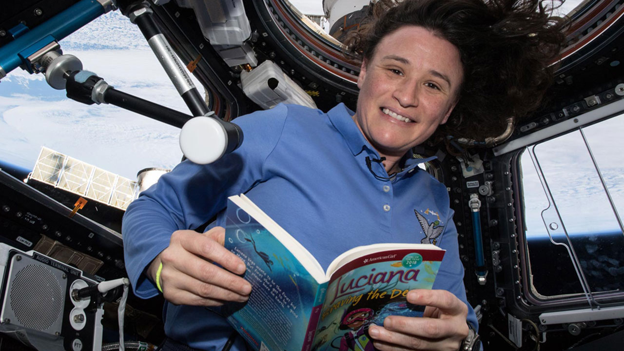 serena-story-time-space NASA astronaut Serena Auñón-Chancellor reads an excerpt from the American Girl book Luciana: Braving the Deep onboard the ISS as part of Story Time From Space.