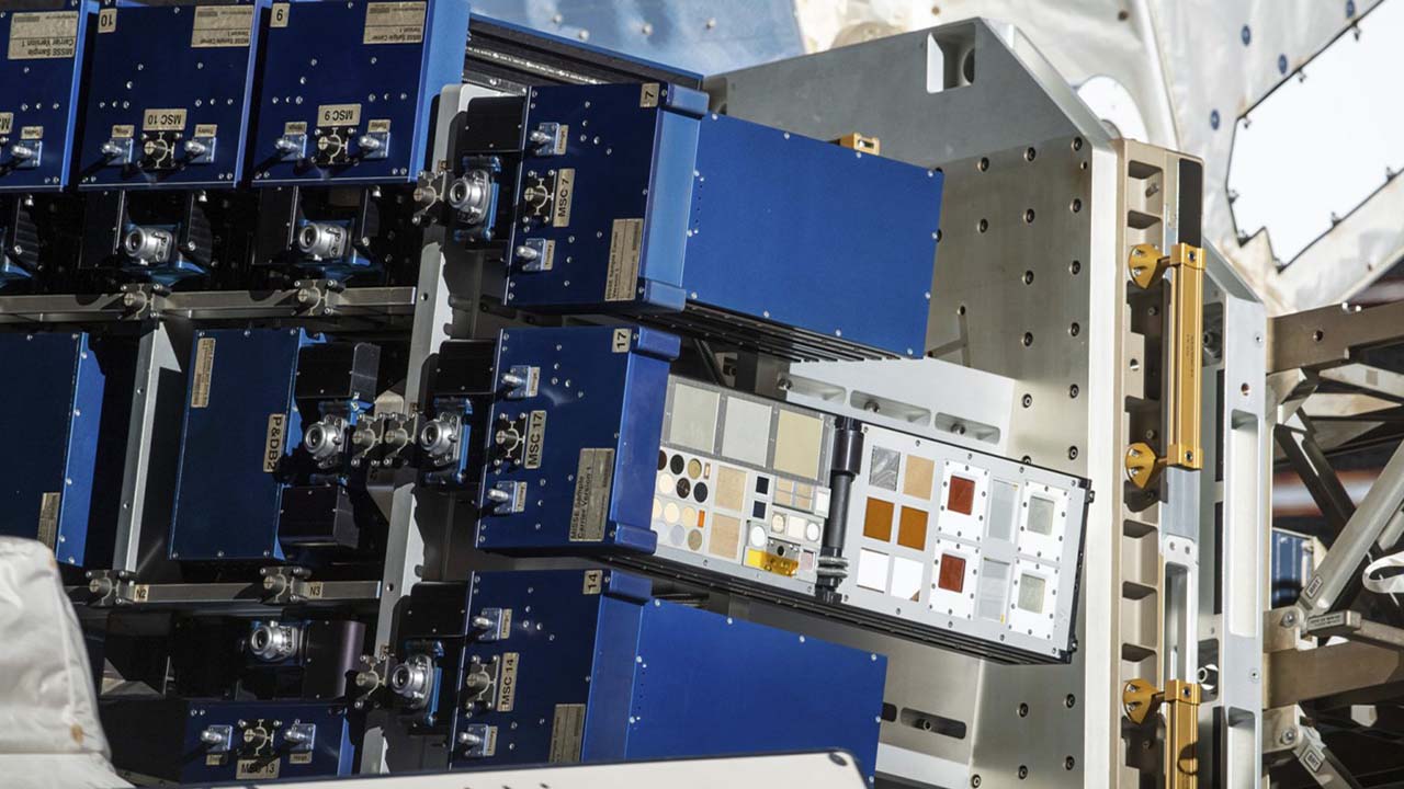 spx27-l3harris-misse The Materials International Space Station Experiment (MISSE) Flight Facility on the exterior of the space station exposes materials to the harsh environment of space.