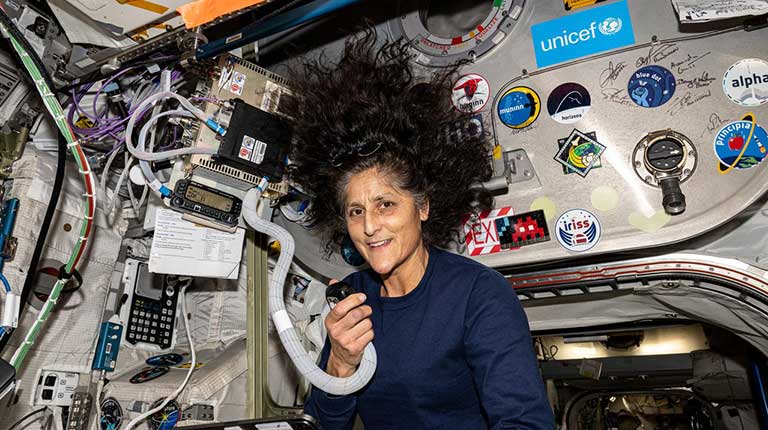 suni-williams-ham-radio-2024 NASA astronaut and Boeing Crew Flight Test Pilot Suni Williams Suni Williams uses a HAM radio and talks to students aboard the International Space Station.