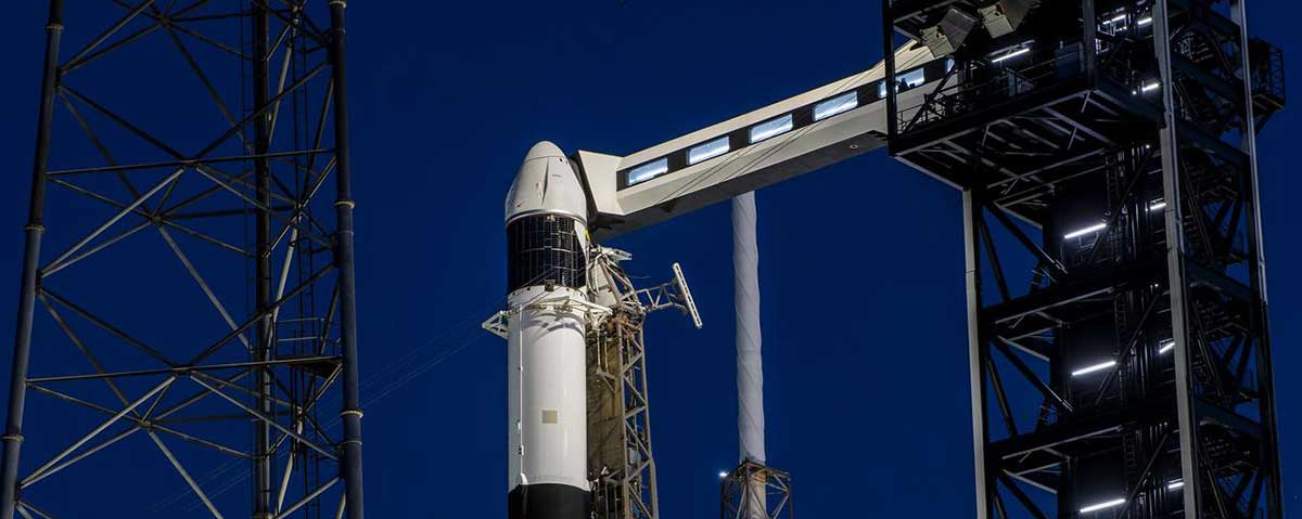 A SpaceX Falcon 9 rocket, with the company’s Dragon spacecraft atop, stands in a vertical position at Space Launch Complex 40 at Cape Canaveral Space Force Station in Florida on Tuesday, March 19, 2024, in preparation for the 30th commercial resupply services launch to the International Space Station.