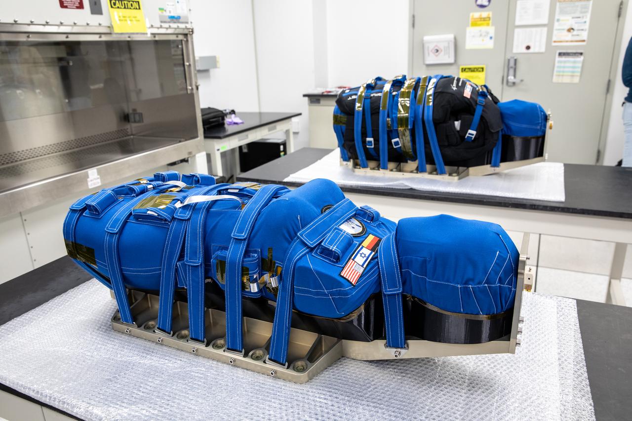 After a 25-day lunar mission, Artemis I Orion manikins Helga and Zohar undergo post-flight inspections at Kennedy Space Center on Jan. 11, 2023. Equipped with radiation detectors, Zohar tested the AstroRad vest to assess its effectiveness for future astronaut protection.