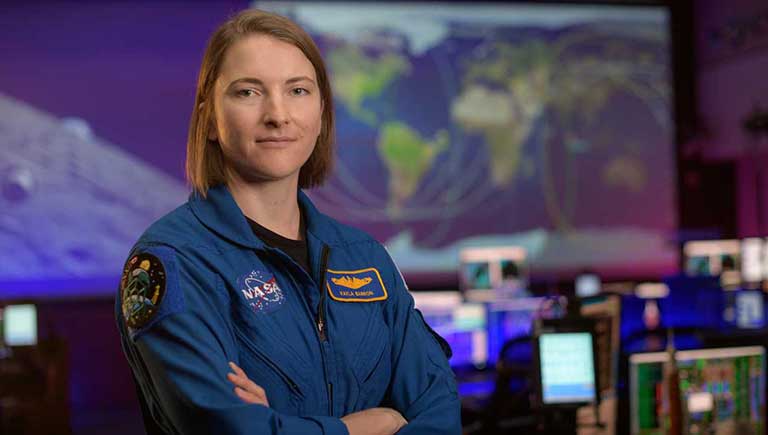 NASA astronaut Kayla Barron in the Blue Flight Control Room at NASA’s Johnson Space Center in Houston